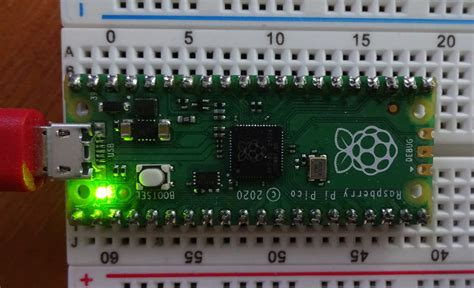 Once the USB cable is attached, release the BOOTSEL button. . Pi pico blink uf2